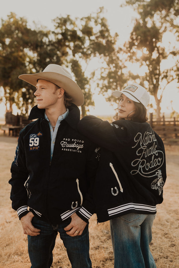 Man and woman wearing Vintage NFR Corduroy Bomber jackets